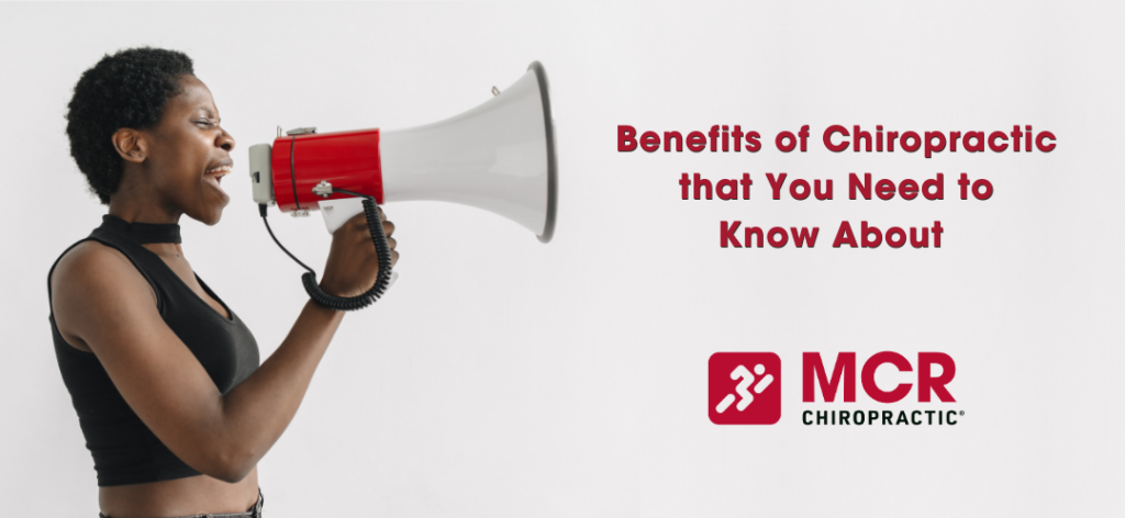 A woman with a megaphone calling attention to the benefits of chiropractic