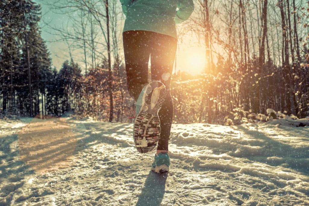 A person jogging through snow